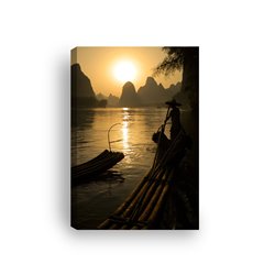 Obraz na płótnie canvas pionowy zachód słońca rybacy łodzie góry pixitex