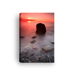 Obraz na płótnie canvas pionowy zachód słońca czerwień skały morze pixitex
